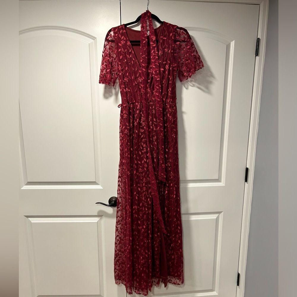 Baltic born women’s burgundy gown with sleeves